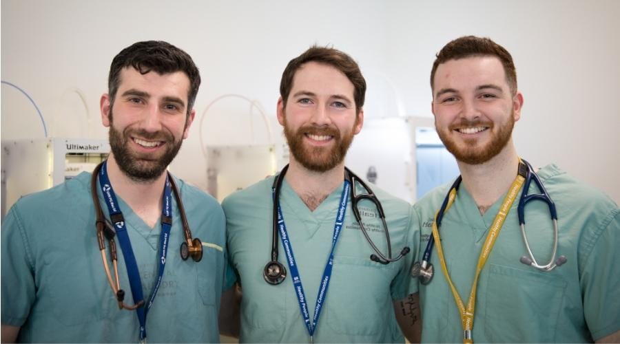 The three doctors that founded PolyUnity in their scrubs.